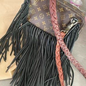 Authentic Louis Vuitton vintage boho crossbody bag.